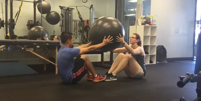 Buddy Ball Sit-Ups: Double the Fun and Double the Workout With Just a Ball and Your Bestie!